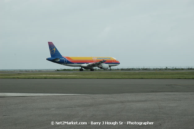 Air Jamaica Airline - Landing & Take Off - MBJ Airports Limited - Sangster International Airport - Domestic Terminal - Montego Bay, St James, Jamaica W.I. - MBJ Limited - Transforming Sangster International Airport into a world class facility - Photographs by Net2Market.com - Negril Travel Guide, Negril Jamaica WI - http://www.negriltravelguide.com - info@negriltravelguide.com...!