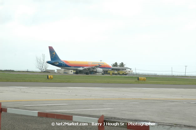 Air Jamaica Airline - Landing & Take Off - MBJ Airports Limited - Sangster International Airport - Domestic Terminal - Montego Bay, St James, Jamaica W.I. - MBJ Limited - Transforming Sangster International Airport into a world class facility - Photographs by Net2Market.com - Negril Travel Guide, Negril Jamaica WI - http://www.negriltravelguide.com - info@negriltravelguide.com...!