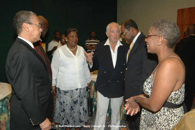 Red Cap Porters Awards - Minister of Tourism, Hon. Edmund Bartlett - Director of Tourism, Basil Smith - Friday, December 14, 2007 - Holiday Inn Sunspree, Montego Bay, Jamaica W.I. - Photographs by Net2Market.com - Barry J. Hough Sr, Photographer - Negril Travel Guide, Negril Jamaica WI - http://www.negriltravelguide.com - info@negriltravelguide.com...!