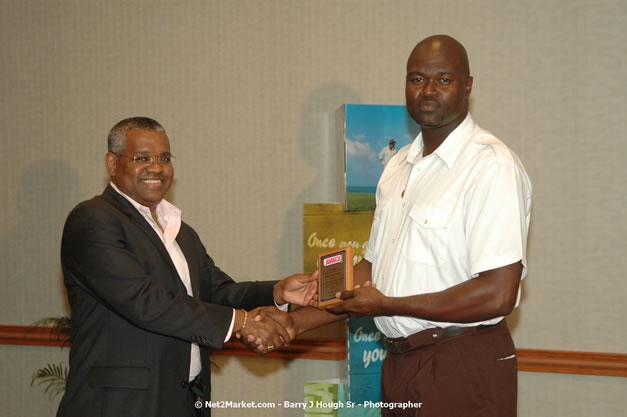 Red Cap Porters Awards - Minister of Tourism, Hon. Edmund Bartlett - Director of Tourism, Basil Smith - Friday, December 14, 2007 - Holiday Inn Sunspree, Montego Bay, Jamaica W.I. - Photographs by Net2Market.com - Barry J. Hough Sr, Photographer - Negril Travel Guide, Negril Jamaica WI - http://www.negriltravelguide.com - info@negriltravelguide.com...!