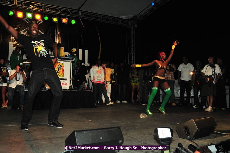 Usain Bolt of Jamaica - The Fastest Man In The World  - Usain Bolt Homecoming Celebrations Concert at the William Knibb High School Play Field, Trelawny - Ice, Ding Dong, Ravers Clavers, D'Angel, Voicemail, RDX and Dancers, Wayne Marshall, Tammi Chynn, Bugle, Nero, Tanya Stephens, Richie Spice, Kip Rich,and Shaggy - Photographs by Net2Market.com - Barry J. Hough Sr. Photojournalist/Photograper - Photographs taken with a Nikon D300 - Negril Travel Guide, Negril Jamaica WI - http://www.negriltravelguide.com - info@negriltravelguide.com...!